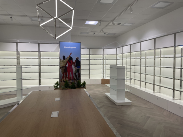 Office refurbishment in Birmingham with a modern retail-style display and unique geometric lighting.