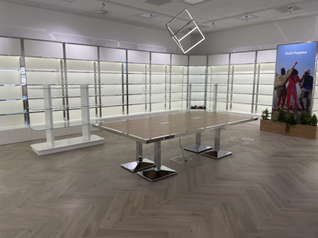 Office refurbishment in Coventry featuring a retail-style display with modern lighting.